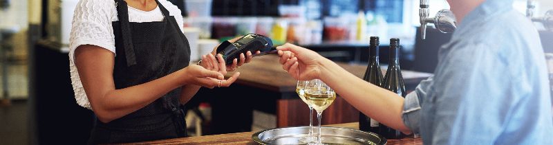 Customer paying for items she purchased.